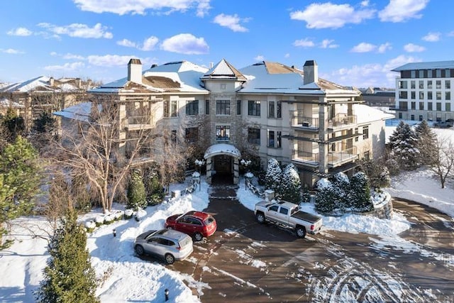 view of snow covered property