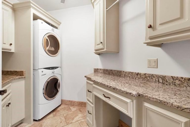 laundry room with stacked washer and clothes dryer