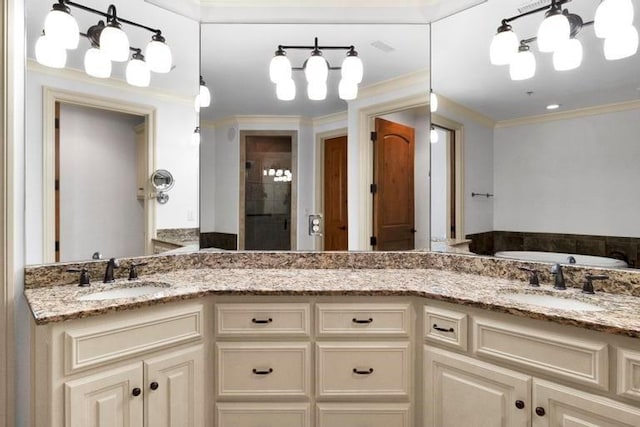 bathroom with vanity, a shower with door, and ornamental molding