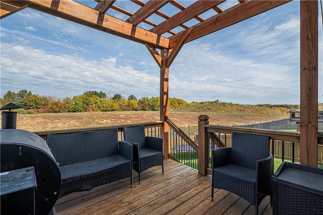 wooden deck featuring outdoor lounge area and a pergola