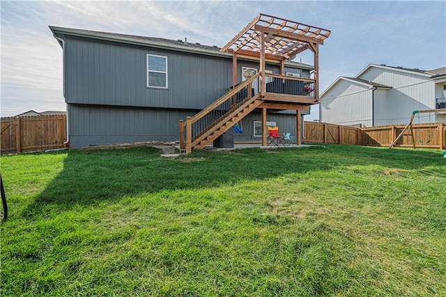 rear view of house with a lawn, a wooden deck, a pergola, and central air condition unit