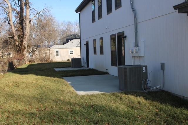 view of yard with a patio area and cooling unit