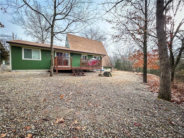 view of front of house with a wooden deck