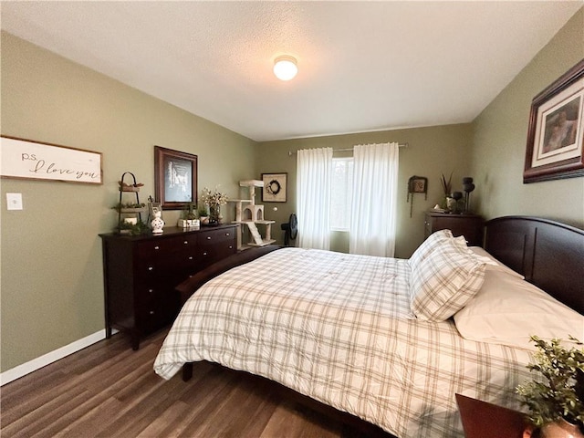 bedroom featuring dark wood-type flooring