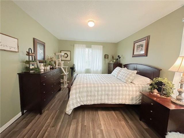 bedroom featuring dark wood-type flooring