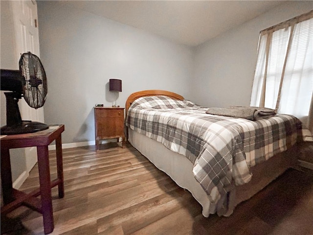 bedroom featuring hardwood / wood-style floors