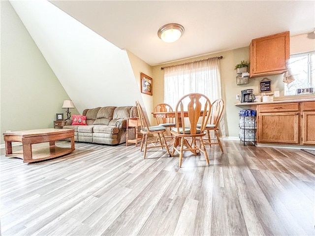 dining area with light hardwood / wood-style floors