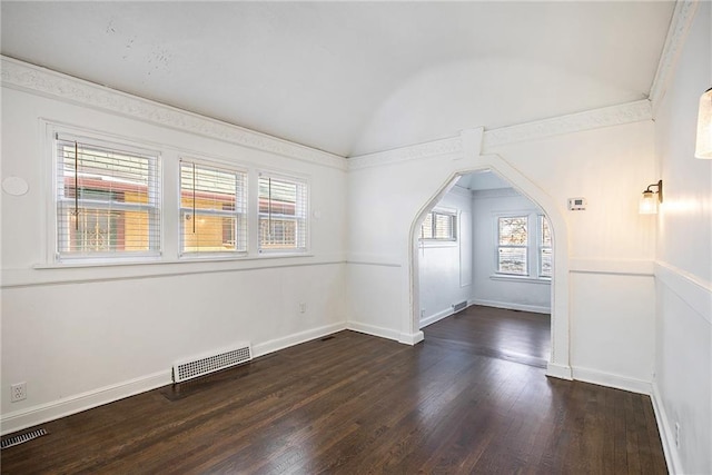 bonus room featuring lofted ceiling and dark hardwood / wood-style flooring