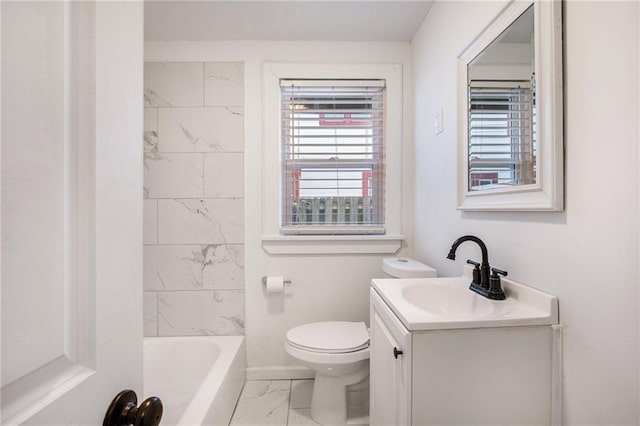 full bathroom with toilet, tiled shower / bath, and vanity