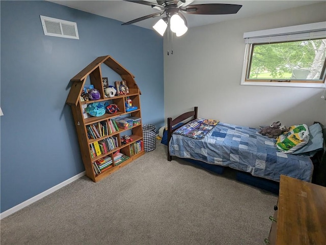 carpeted bedroom with ceiling fan