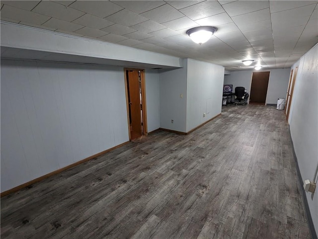 basement with hardwood / wood-style floors