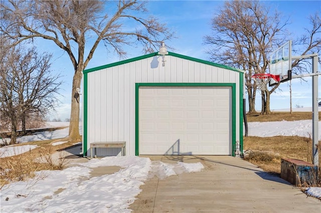 view of snow covered garage