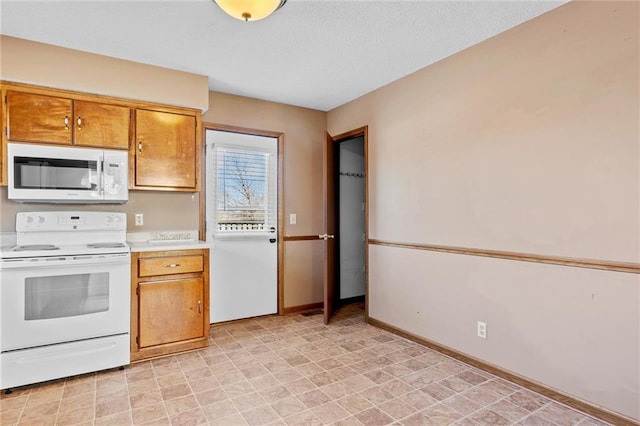 kitchen with white appliances