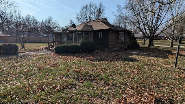 view of home's exterior with a lawn