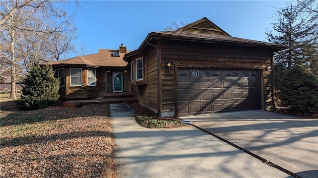 view of front of home with a garage