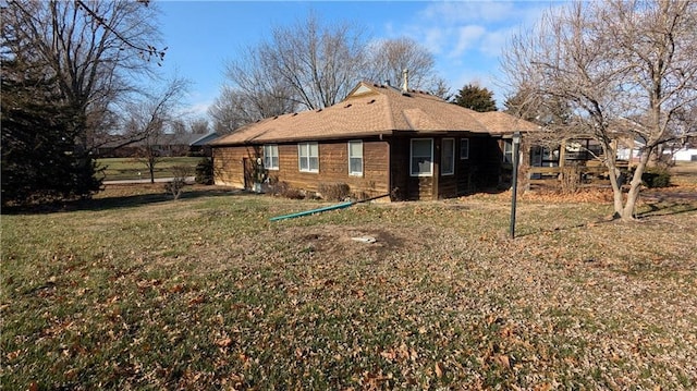 view of home's exterior featuring a lawn