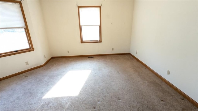 view of carpeted spare room