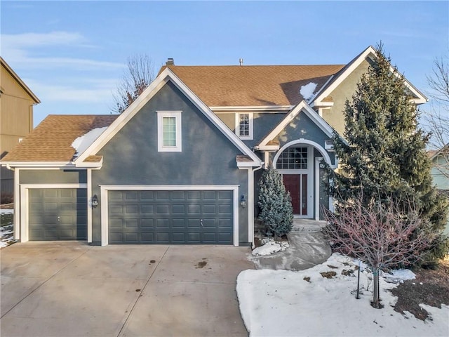 view of front of property with a garage