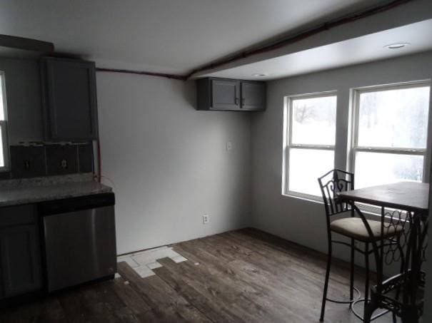 dining room with dark hardwood / wood-style flooring