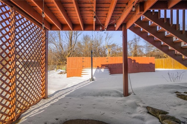 view of snow covered patio