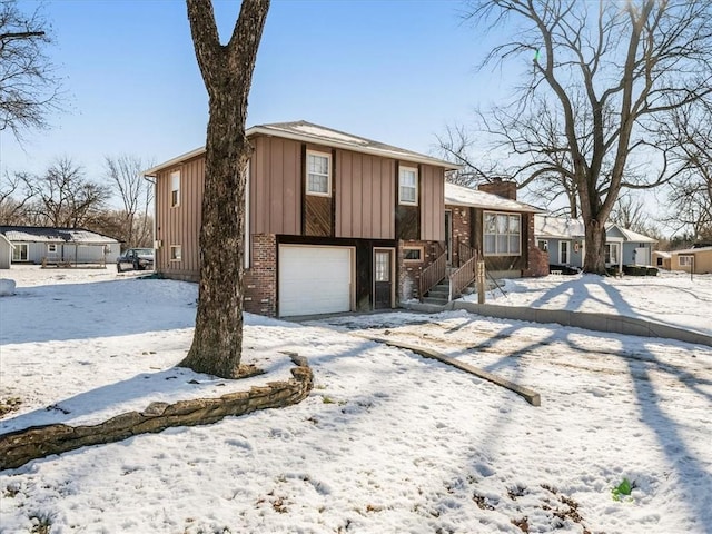 split level home featuring a garage