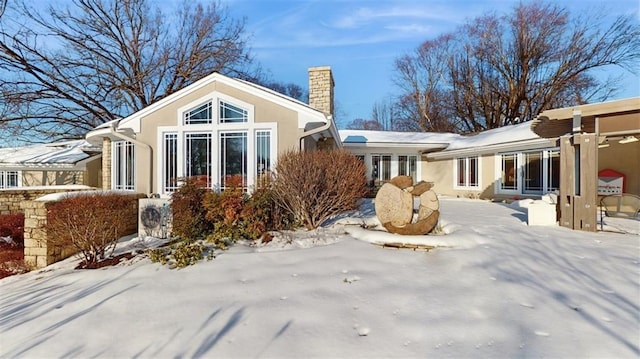 view of snow covered property