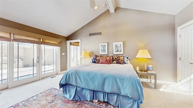 carpeted bedroom with access to exterior and lofted ceiling with beams