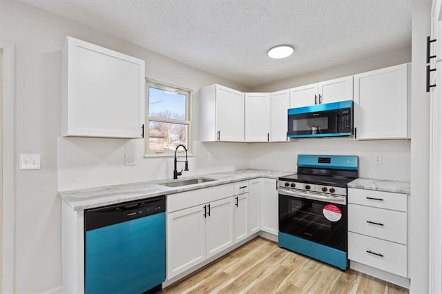 kitchen with white cabinetry, electric range, dishwasher, light stone counters, and sink