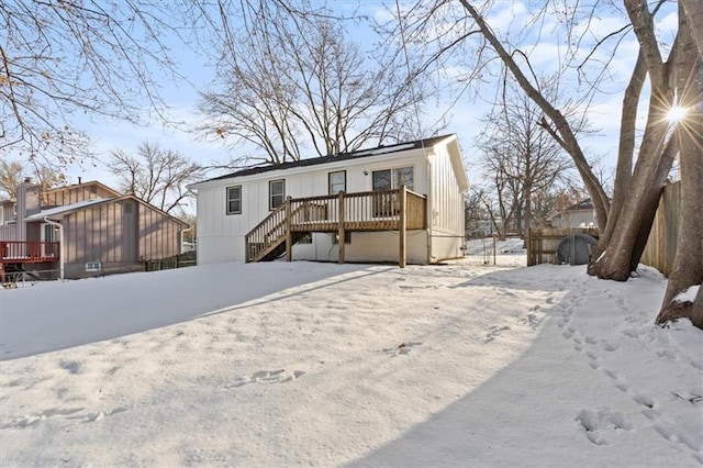 view of front of property with a wooden deck