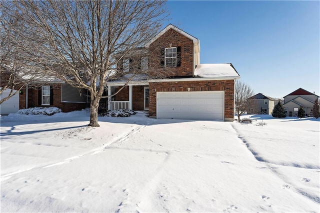 view of front of house featuring covered porch and a garage