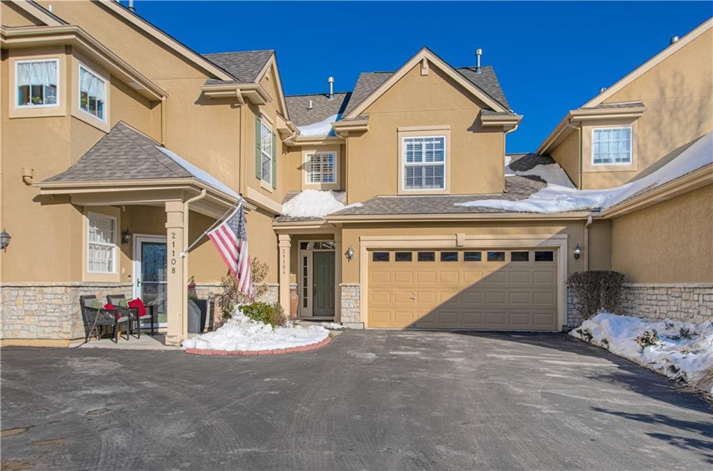 view of front of property with a garage