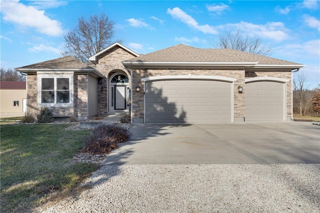 single story home with a front lawn and a garage