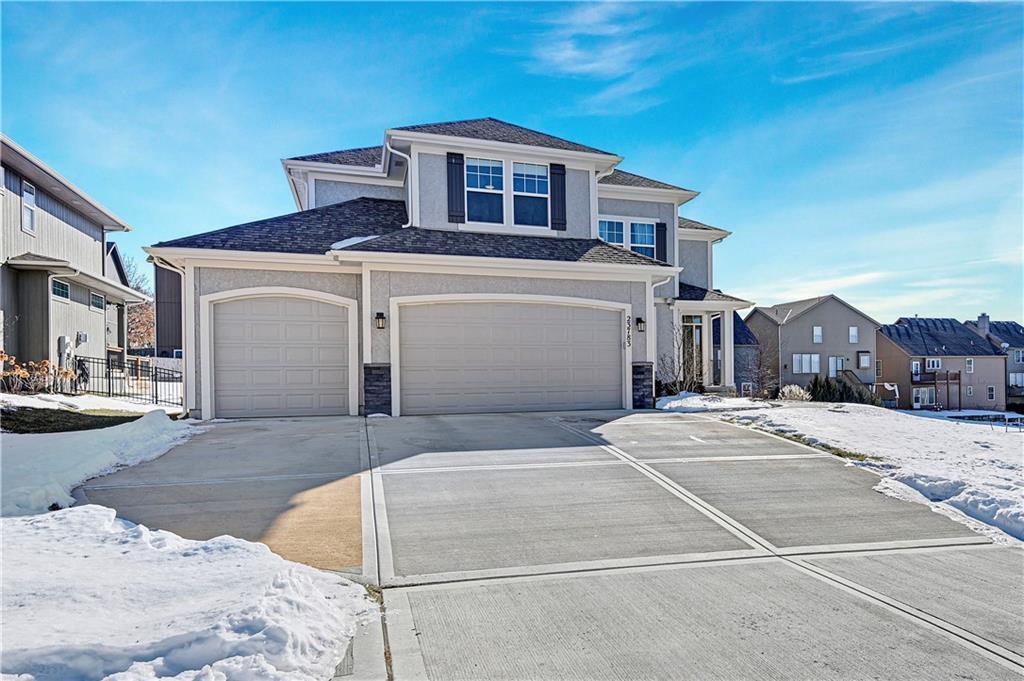 view of front of home with a garage