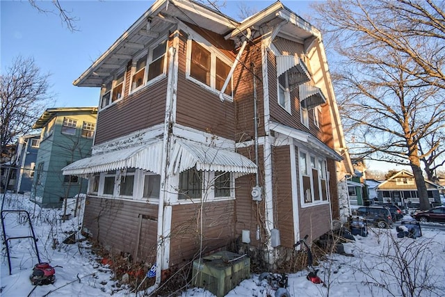 view of snow covered property