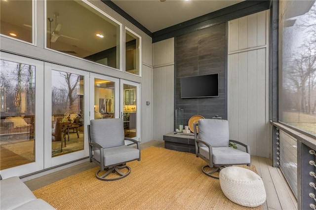 sunroom featuring french doors