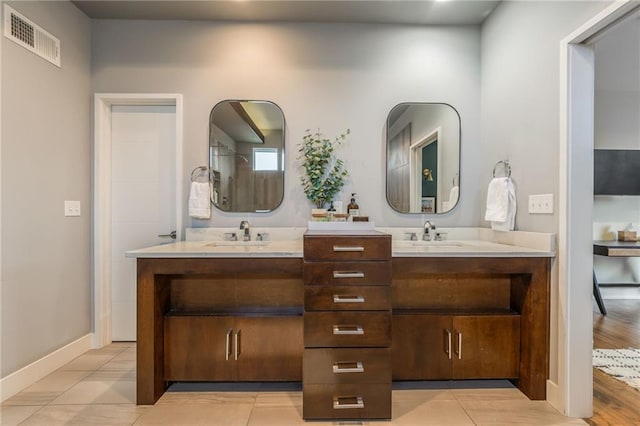 bathroom featuring vanity and tile patterned floors