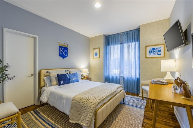 bedroom featuring wood-type flooring