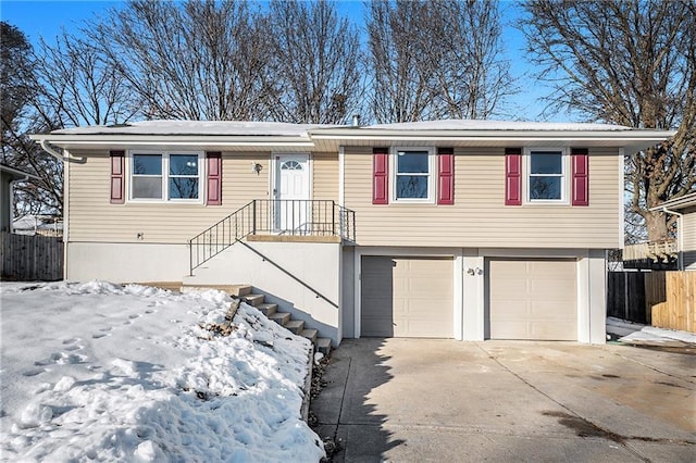 view of front of home with a garage