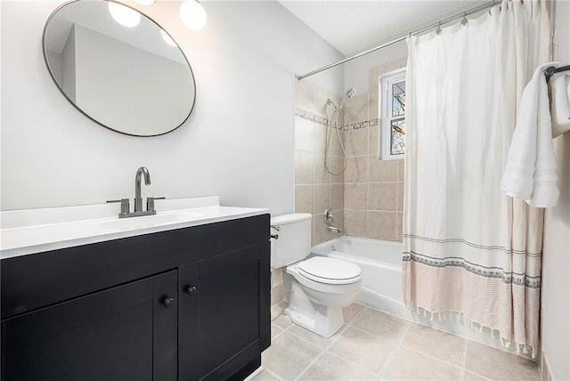 full bathroom featuring shower / tub combo with curtain, vanity, and toilet