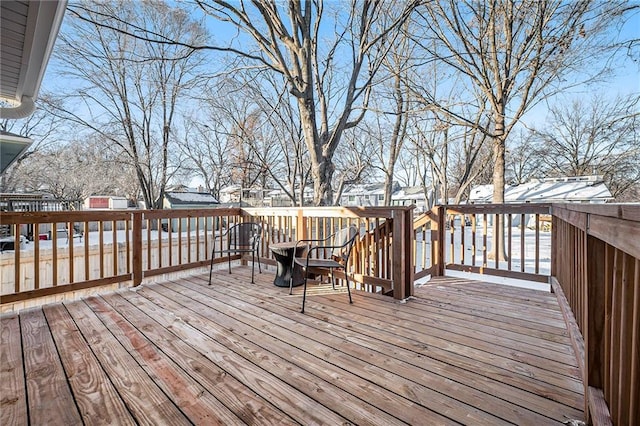 view of snow covered deck