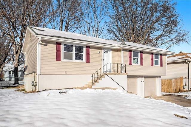 view of front of home with a garage