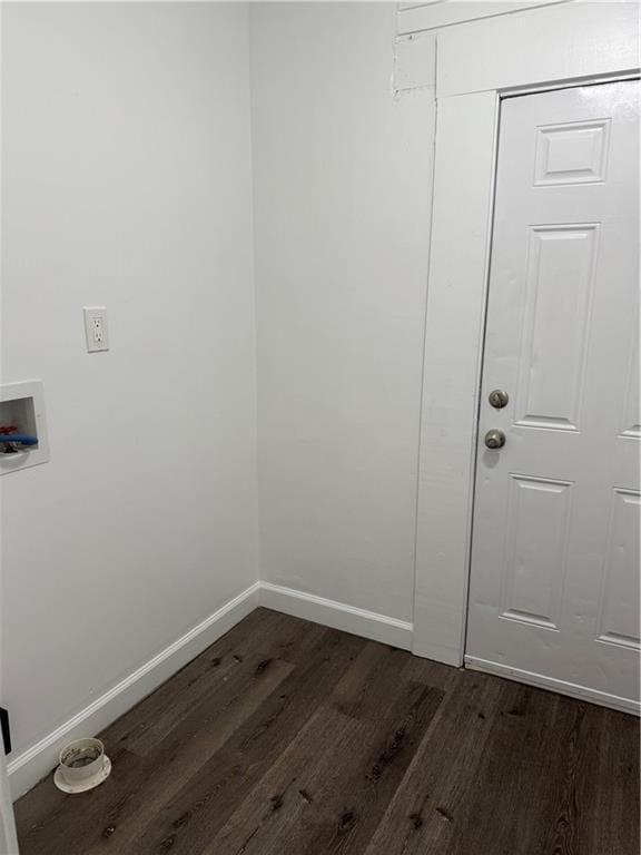 clothes washing area with baseboards, laundry area, dark wood finished floors, and hookup for a washing machine