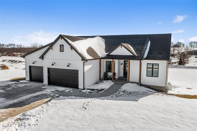 modern farmhouse with a garage