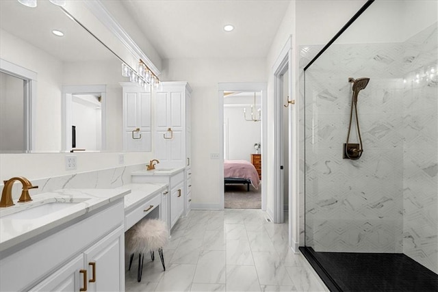 bathroom featuring vanity and tiled shower