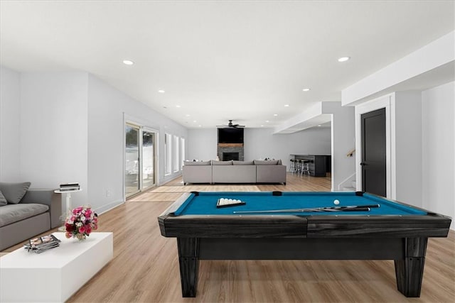 playroom featuring light hardwood / wood-style floors and billiards