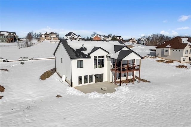 view of snow covered property