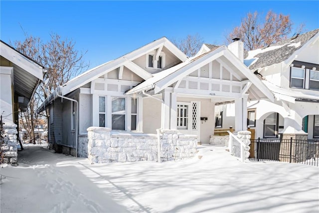 view of snow covered house