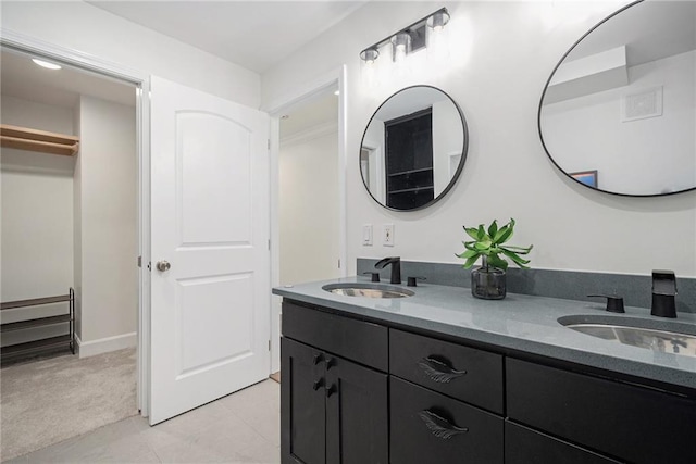 bathroom featuring vanity and tile patterned flooring