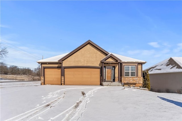 view of front of property with a garage, stone siding, and stucco siding