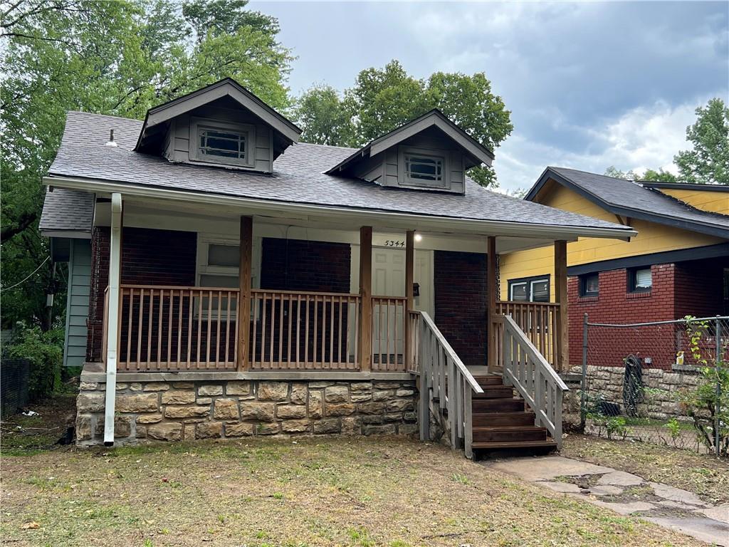 bungalow-style house featuring covered porch